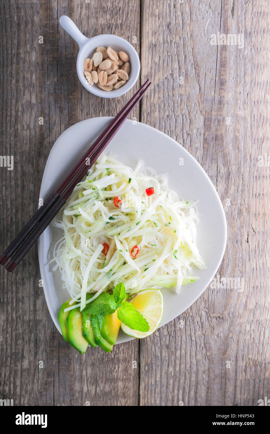 Spicy kohlrabi noodles, dressing fish sauce, vinegar rices, lime