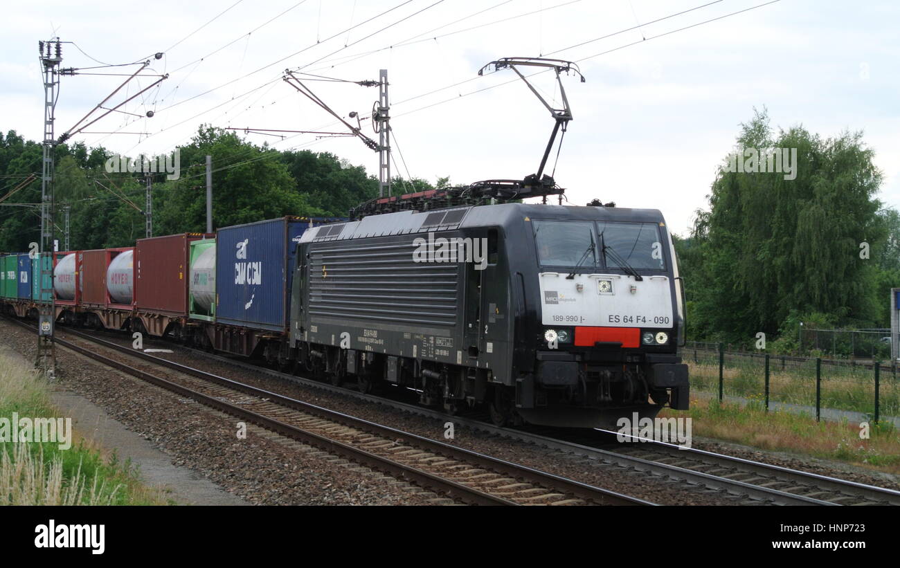 Class 189 Eurosprinter locomotive with container wagons entering Venlo, Netherlands Stock Photo