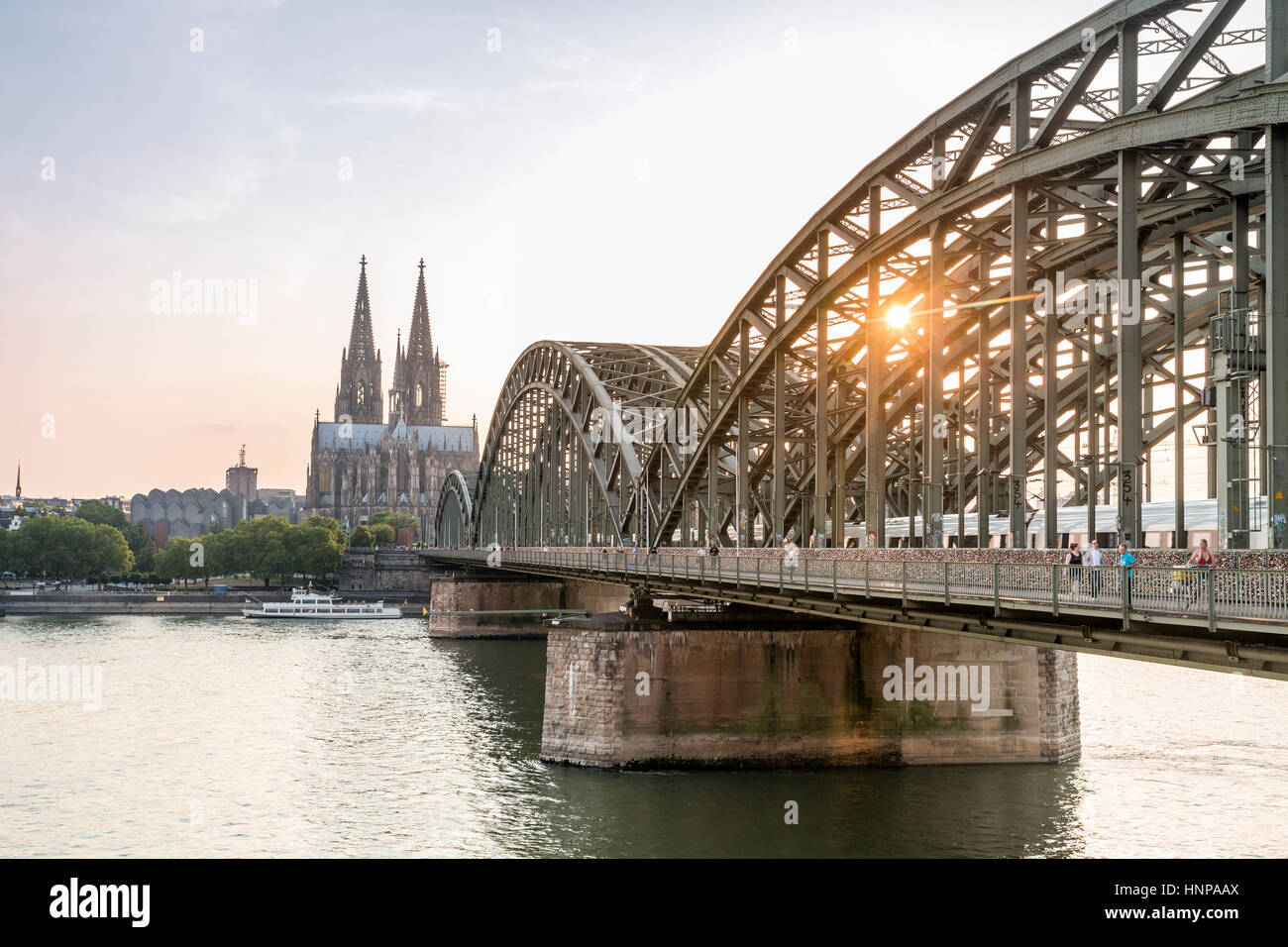 Cathedral and steel bridge, Koln, Germany Stock Photo