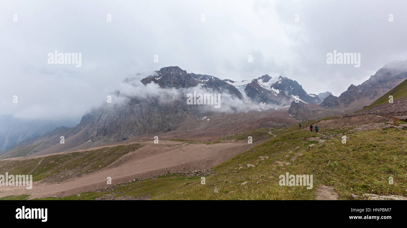 Kazakhstan mountains. Cloudy mountains of Medeu in Kazakhstan, Shymbulak. Stock Photo