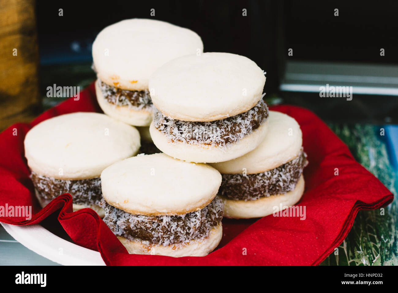 Homemade alfajores on a plate with a red napkin Stock Photo