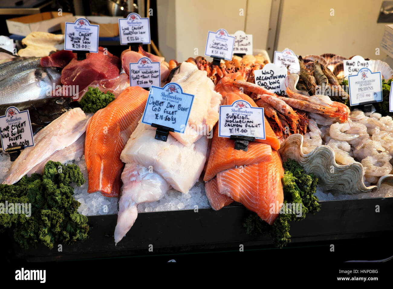 Fish stall display at Borough Market near London Bridge in Southwark, South London, UK  KATHY DEWITT Stock Photo