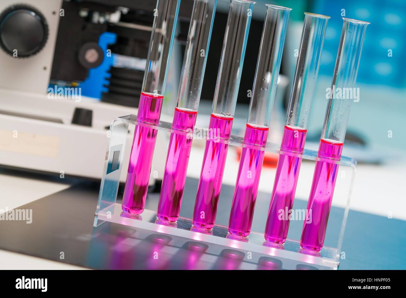 Science laboratory with a microscope, biological material samples and a