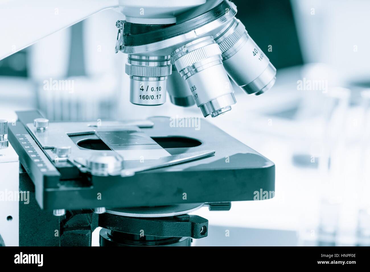 Science laboratory with a microscope, biological material samples and a