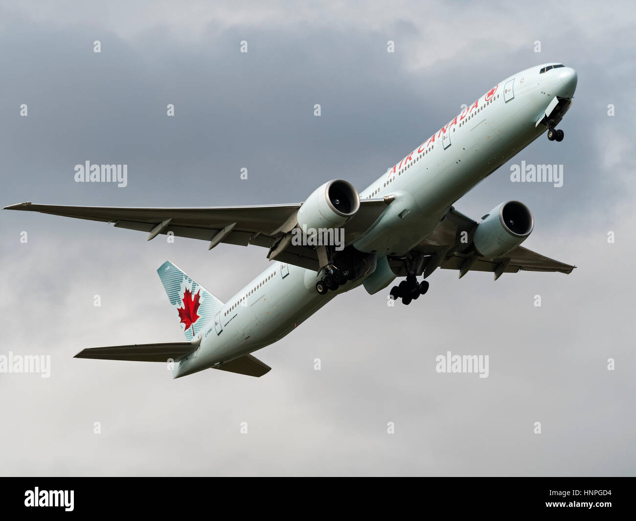 An Air Canada Boeing 777-300ER (C-FNNU) wide-body jet airliner airborne after take off from Vancouver International Airport, Canada Stock Photo