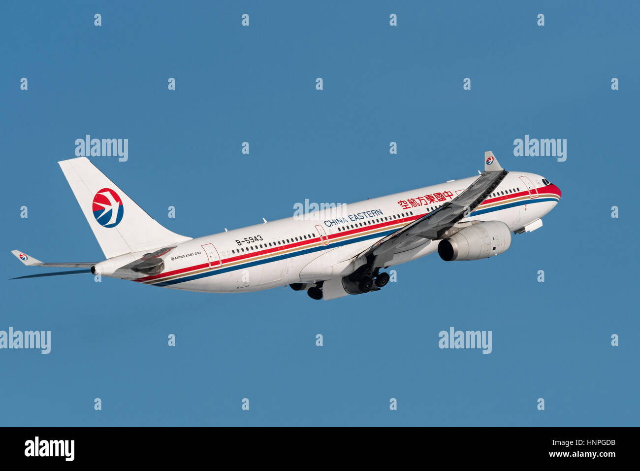China Eastern Airlines plane airplane Airbus A330 (A330-200) wide-body jet airliner jetliner airborne Stock Photo