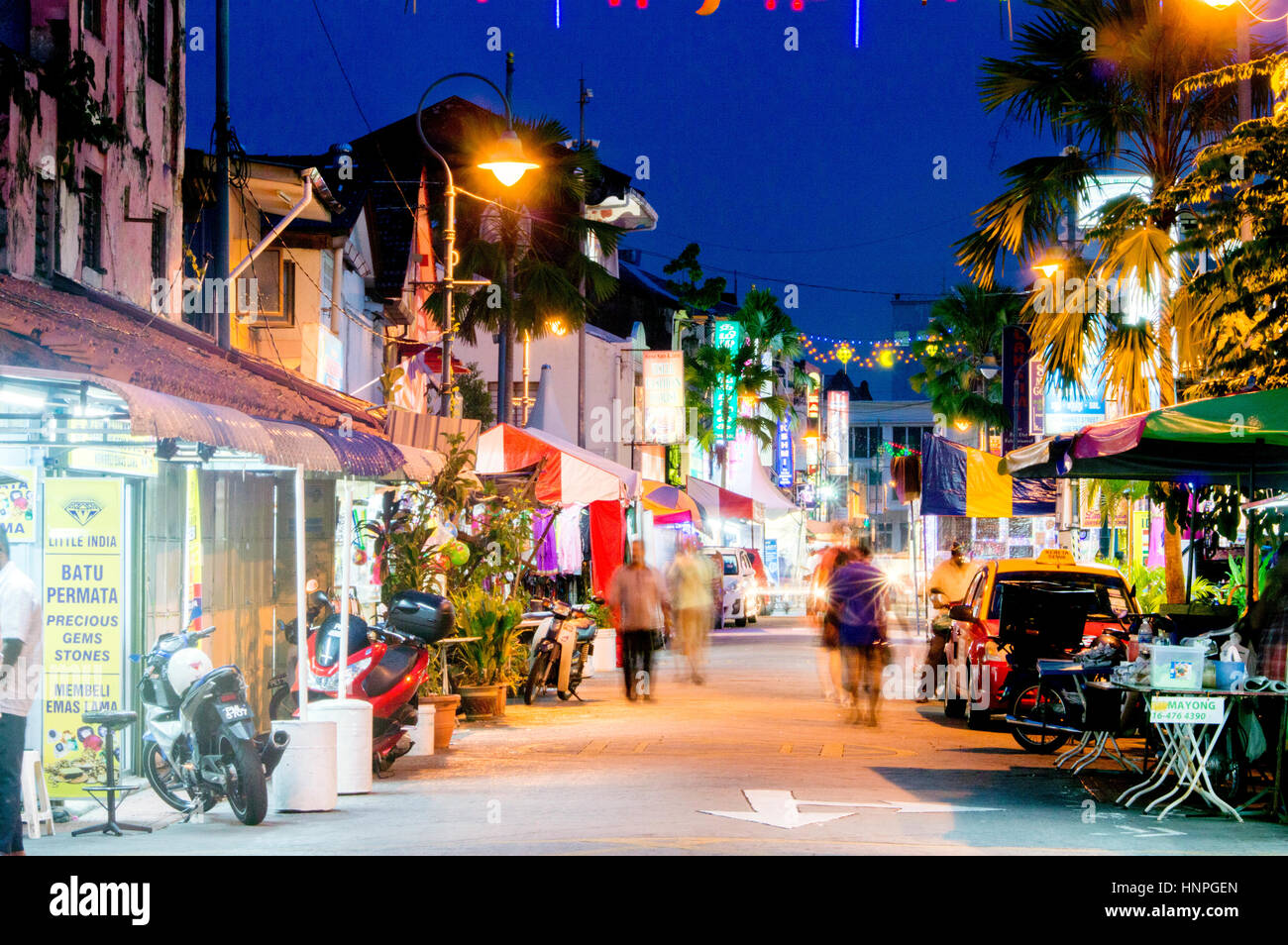Street scene at night with indian shops and stall, Lebuh Pasar, Little India, Georgetown, Penang, Malaysia Stock Photo