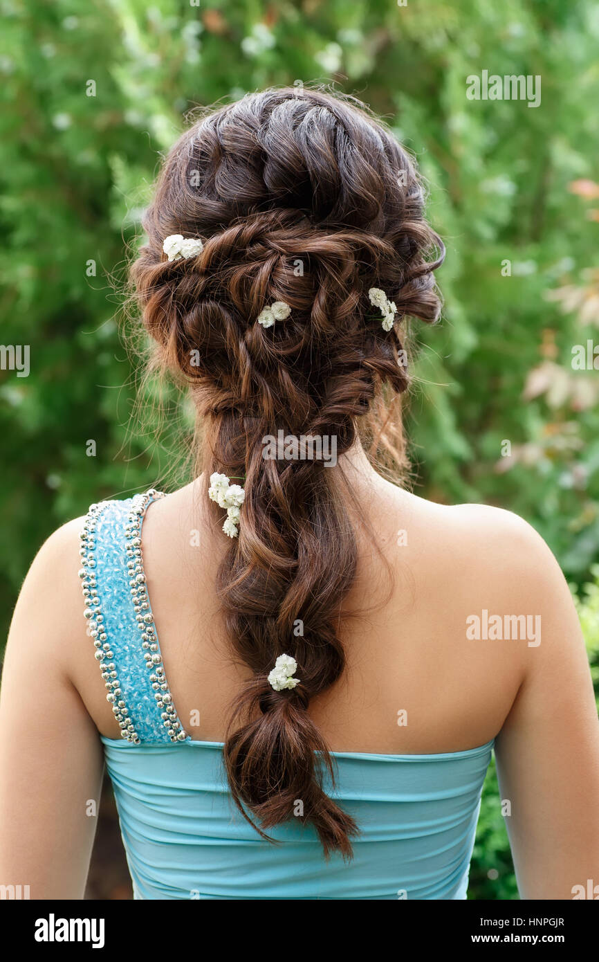 Elegant Hairstyle With Fresh Flowers In A Plait Woman With