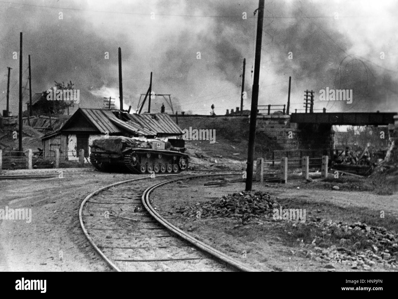 The Nazi propaganda image shows a German Wehrmacht tank in embattled Stalingrad (today Volgograd). Taken in October 1942. A Nazi reporter has written on the reverse of the picture  on 15.10.1942, 'Mechanised infantry troops rolling into Stalingrad. In the smoke and thick fumes fumes of the intensely embattled town, the sun is almost eclipsed.' Fotoarchiv für Zeitgeschichte - NO WIRE SERVICE -  | usage worldwide Stock Photo