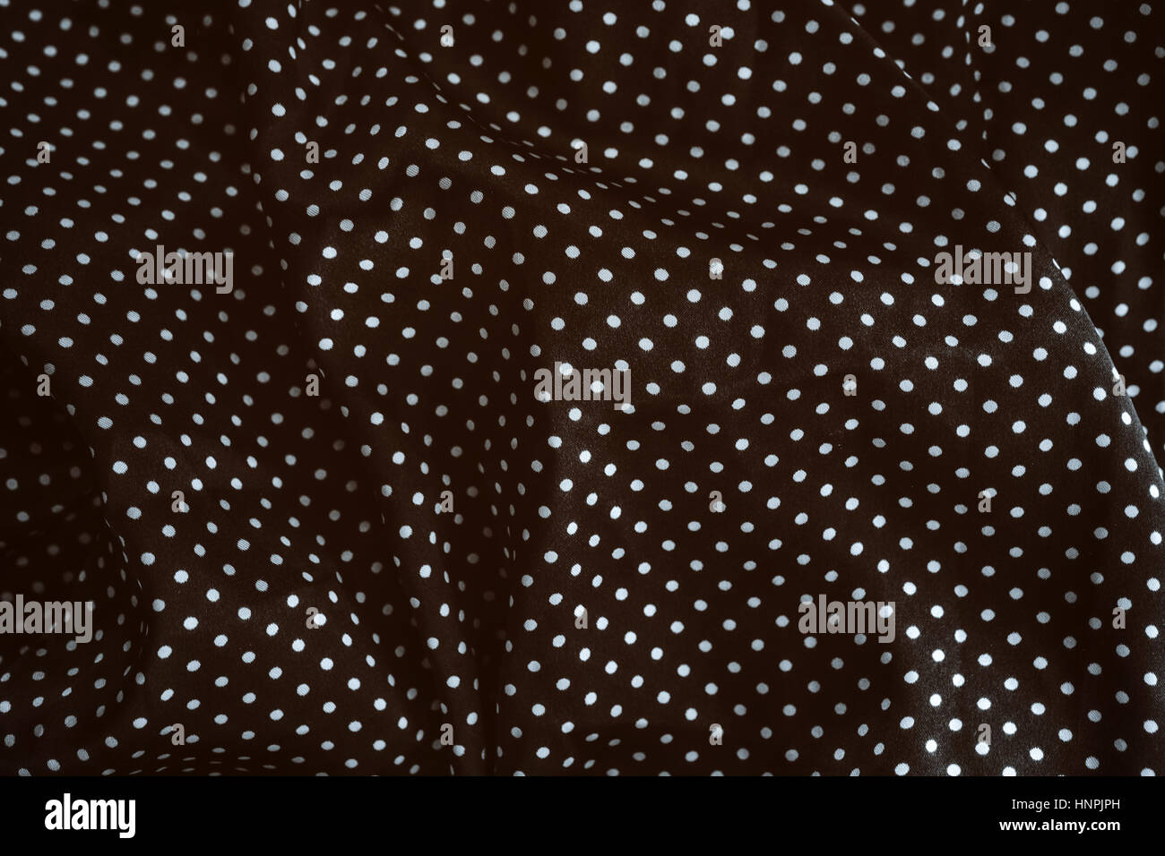 Texture of silk fabric with polka dots Stock Photo