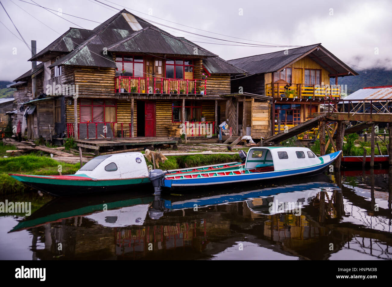 Colorful houses and boats at Laguna De La Corota, Colombia Stock Photo