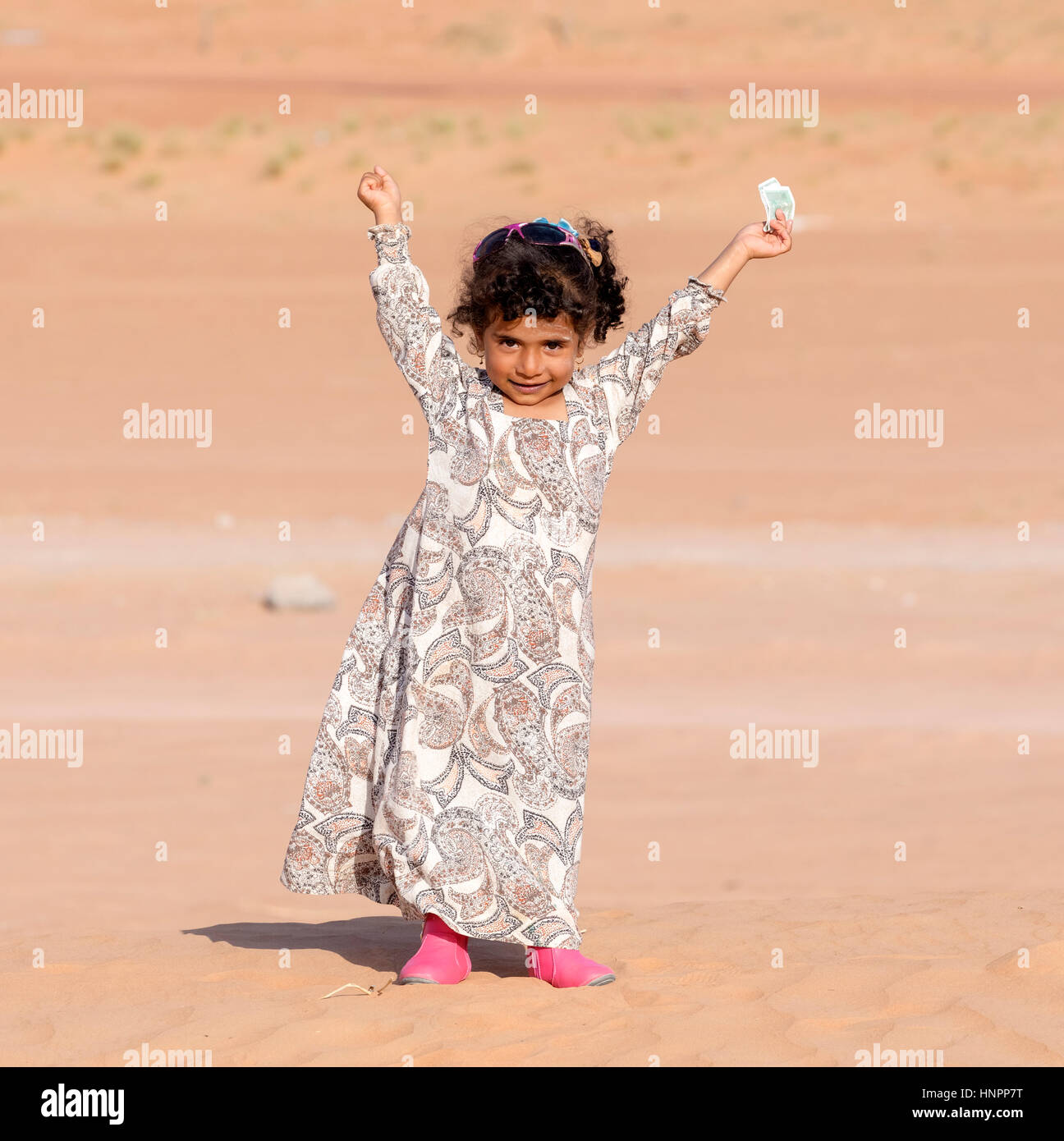 Bedouin girl in Wahiba Sands, Oman, Middle East, Asia Stock Photo