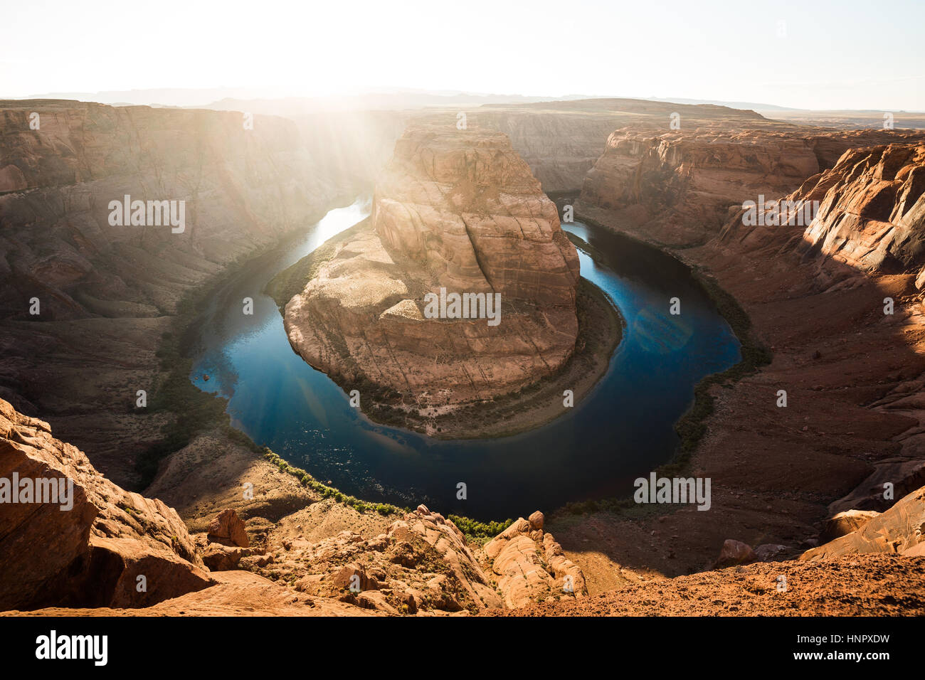 Classic wide-angle view of famous Horseshoe Bend, a horseshoe-shaped meander of the Colorado River in beautiful evening light at sunset, Arizona, USA Stock Photo