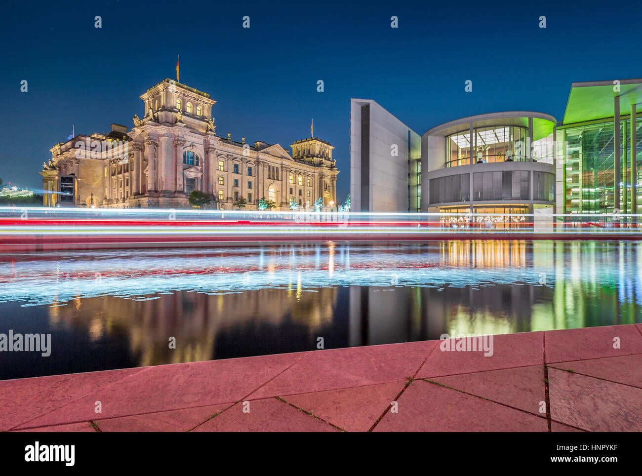 Panoramic view of Berlin government district with famous Reichstag and Bundestag building in post sunset twilight at dusk, central Berlin, Germany Stock Photo