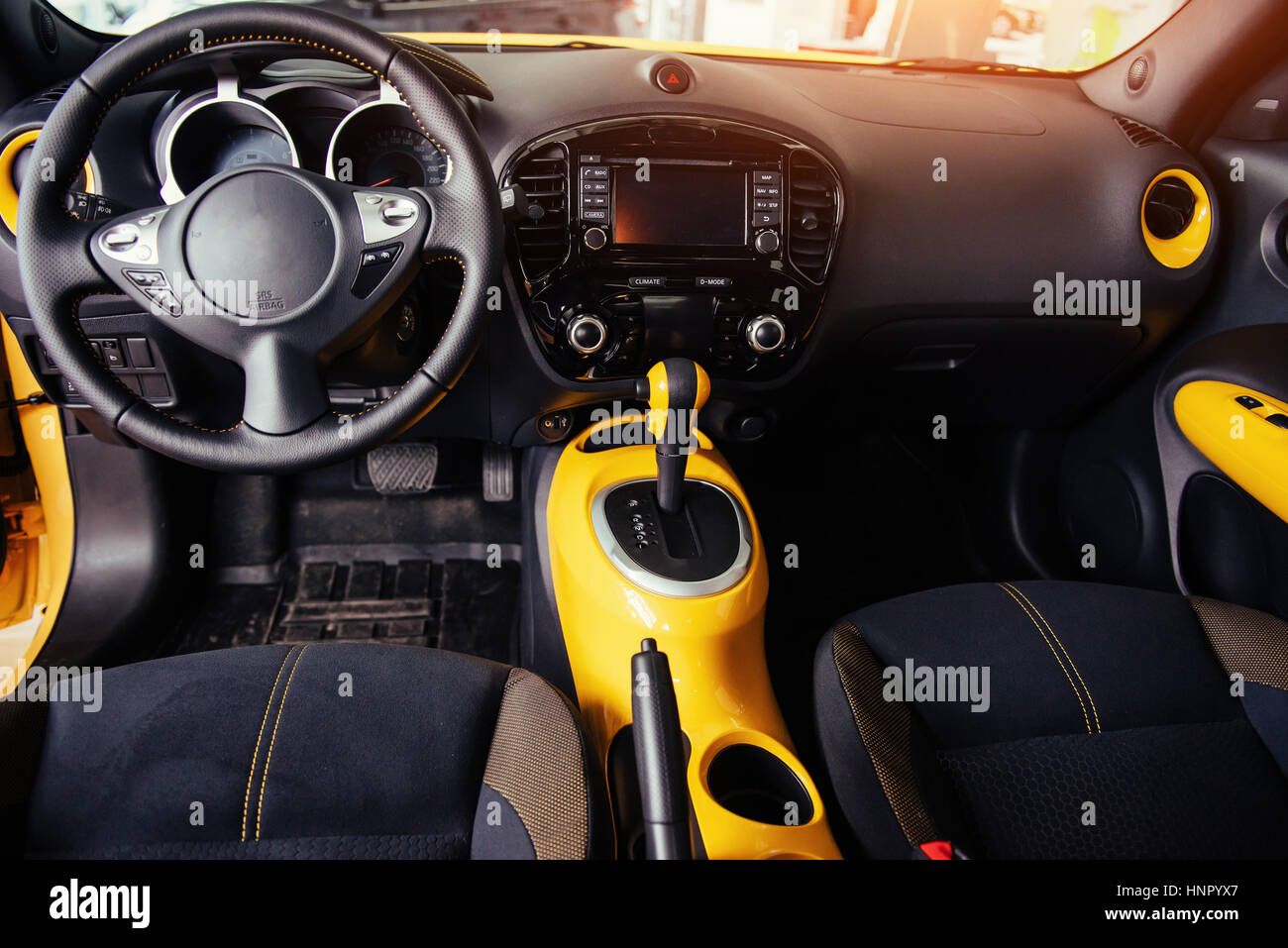 Modern car interior dashboard and steering wheel Stock Photo - Alamy