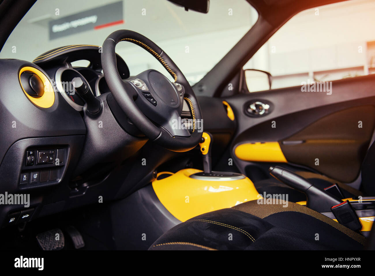 Modern car interior dashboard and steering wheel Stock Photo - Alamy