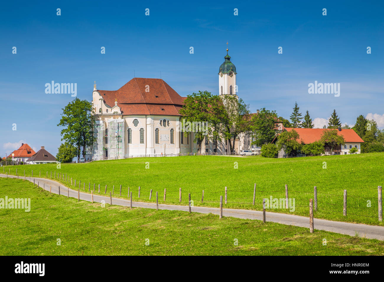 Beautiful view of famous oval rococo Pilgrimage Church of Wies (Wieskirche), a UNESCO World Heritage Site since 1983, in summer, Bavaria, Germany Stock Photo