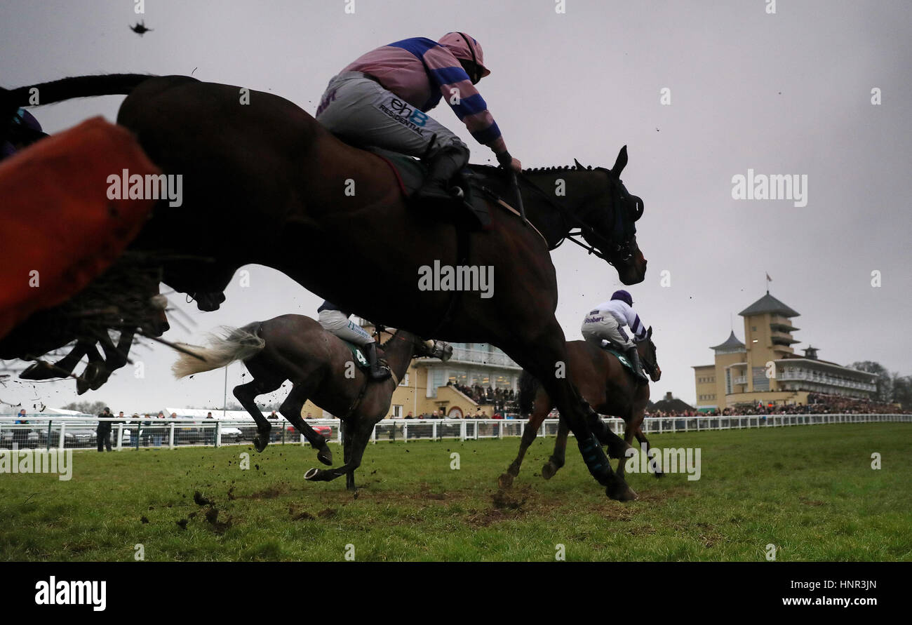 Charlie Poste Racing Some Finish ridden by Charlie Poste takes a hurdle in the Towcester ...