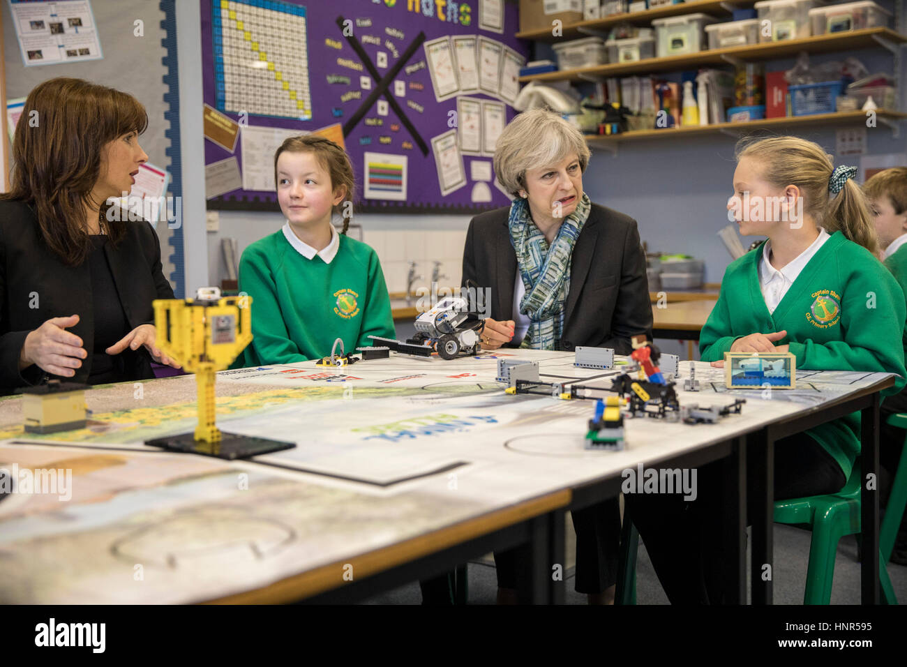 Prime Minister Theresa May sits with year six pupils during a visit to Captain Shaw's Primary School in Bootle, Merseyside, with Conservative Party candidate for the Copeland by-election, Trudy Harrison. Stock Photo