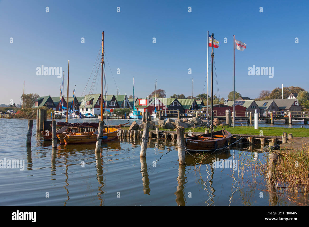 Sailing boats and boathouses at the harbour of Althagen at Fischland-Darß-Zingst, Mecklenburg-Vorpommern, Germany Stock Photo
