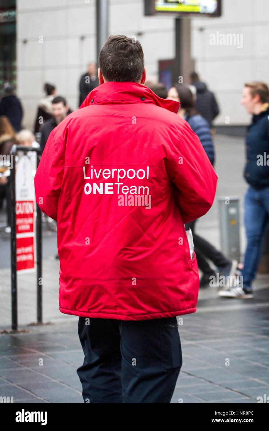 Liverpool One shopping Team security guard, wearing hi-vis red coat Stock  Photo - Alamy