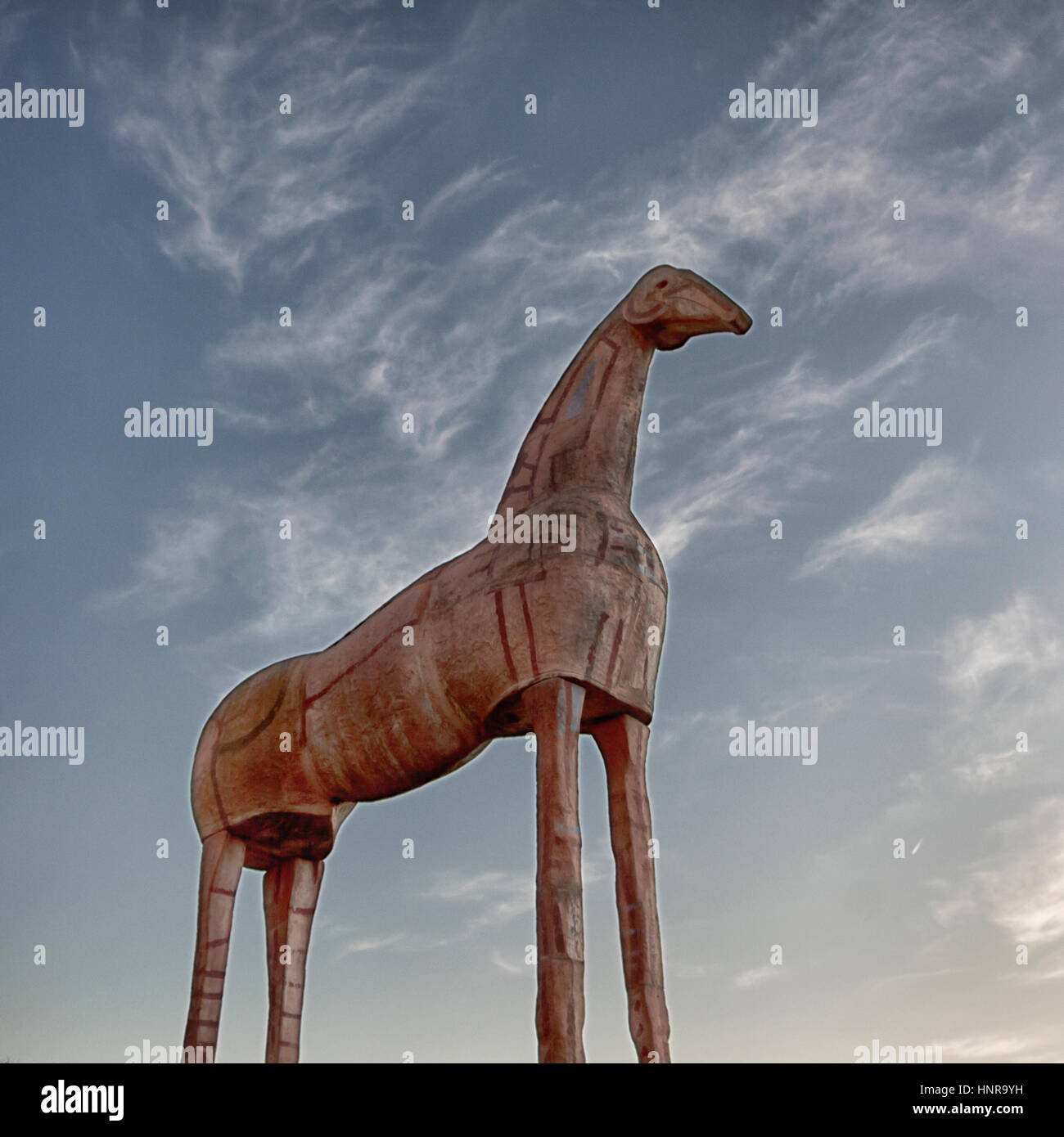Big horse statue stands in the sky, this figure reminds horse of troy