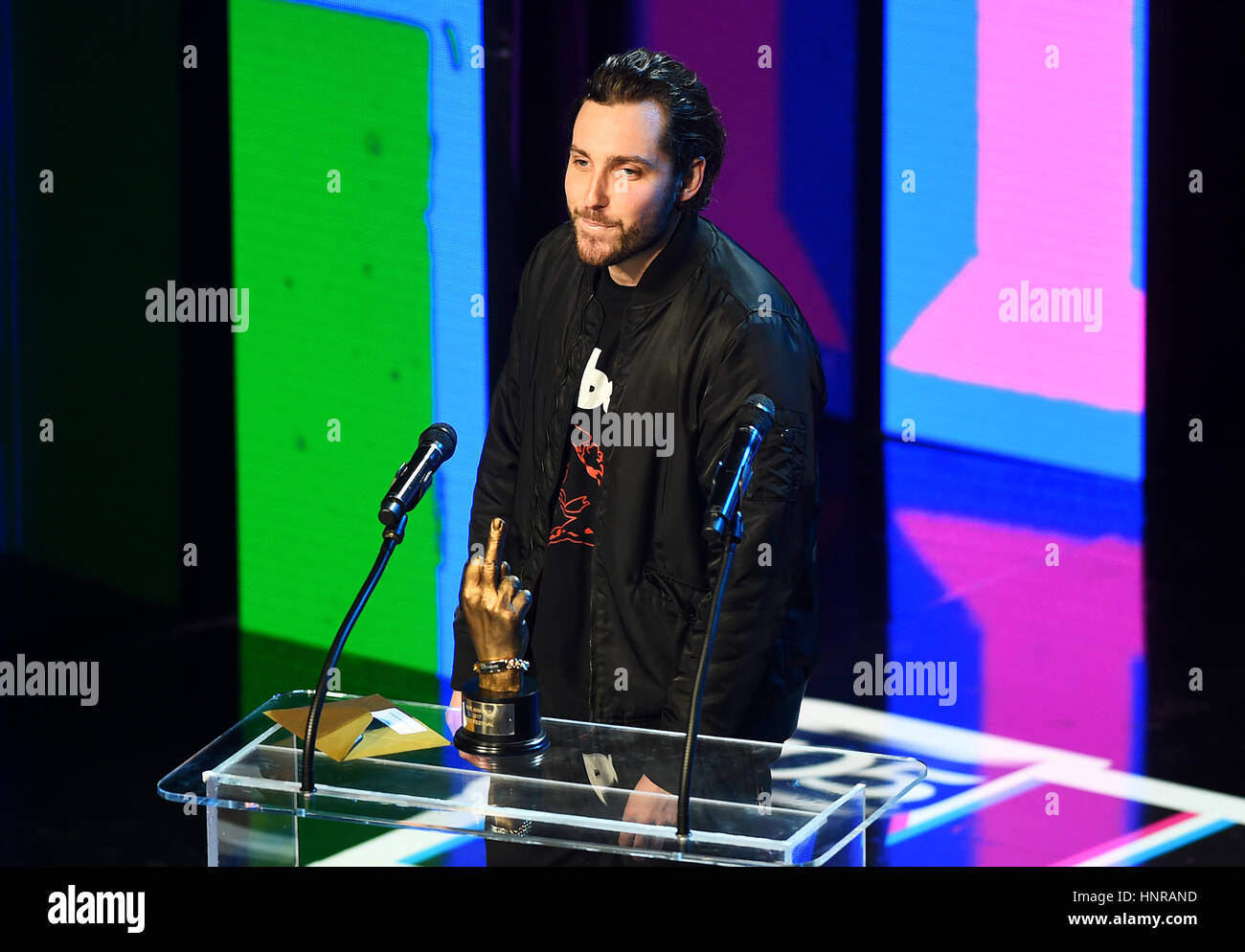 Josh Franceschi from You Me At Six presenting the award for Best Festival during the VO5 NME Awards 2017 held at the O2 Brixton Academy, London. Stock Photo