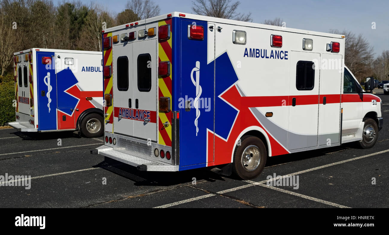 Two parked ambulances. Rear and side views. Stock Photo