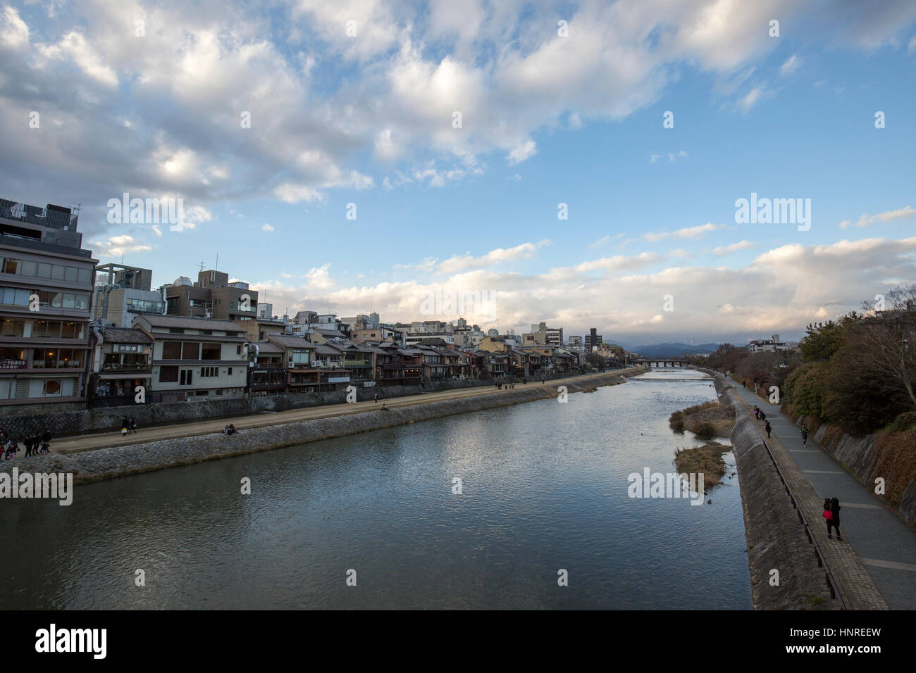 View of the Kamo River from Shijo bridge , Kyoto . Shijo bridge spands the Kamo River as part of Shijo-dori (Fourth Avenue) in Kyoto, Japan Stock Photo