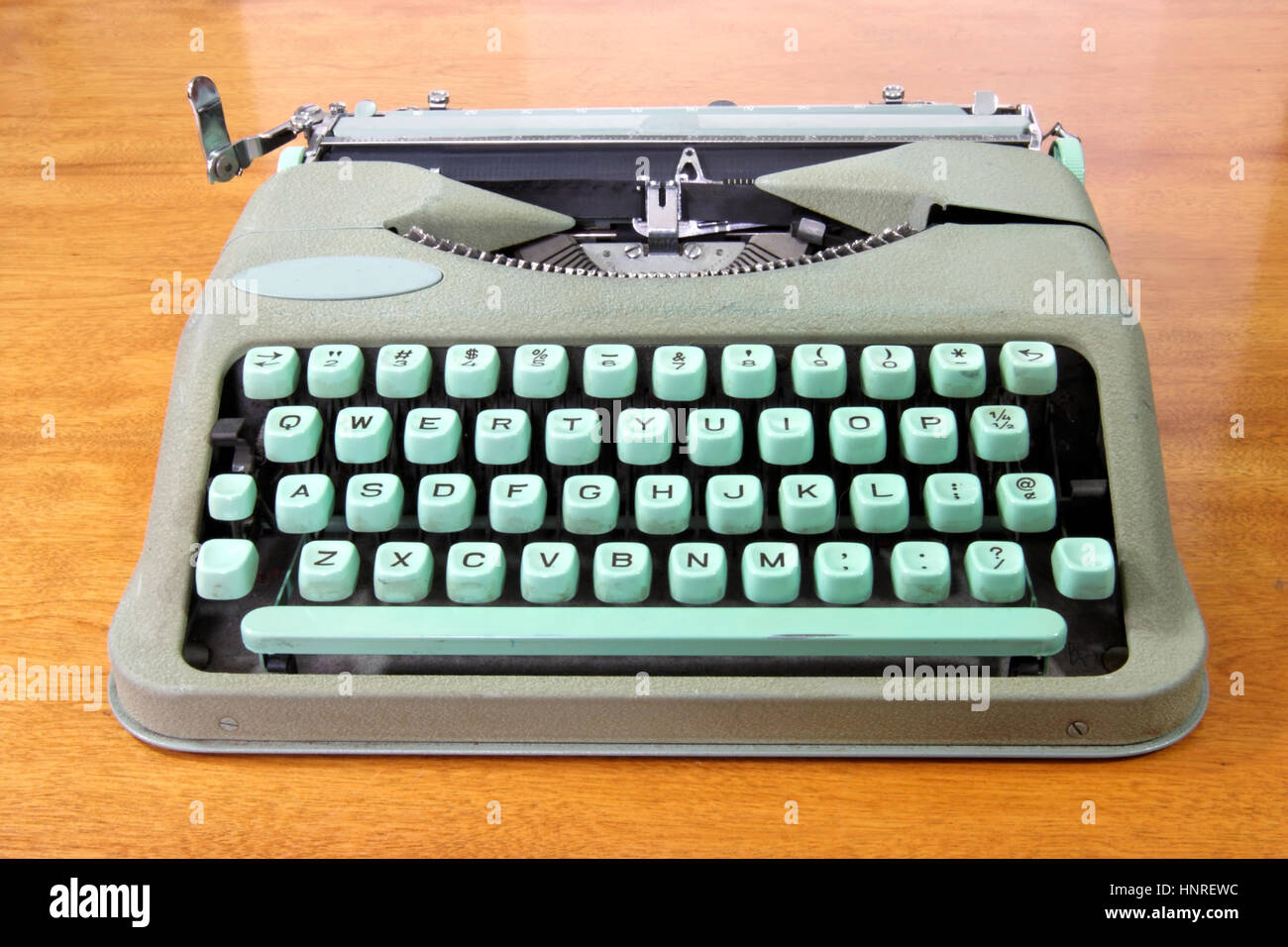Old, obsolete portable typewriter on wood table Stock Photo Alamy