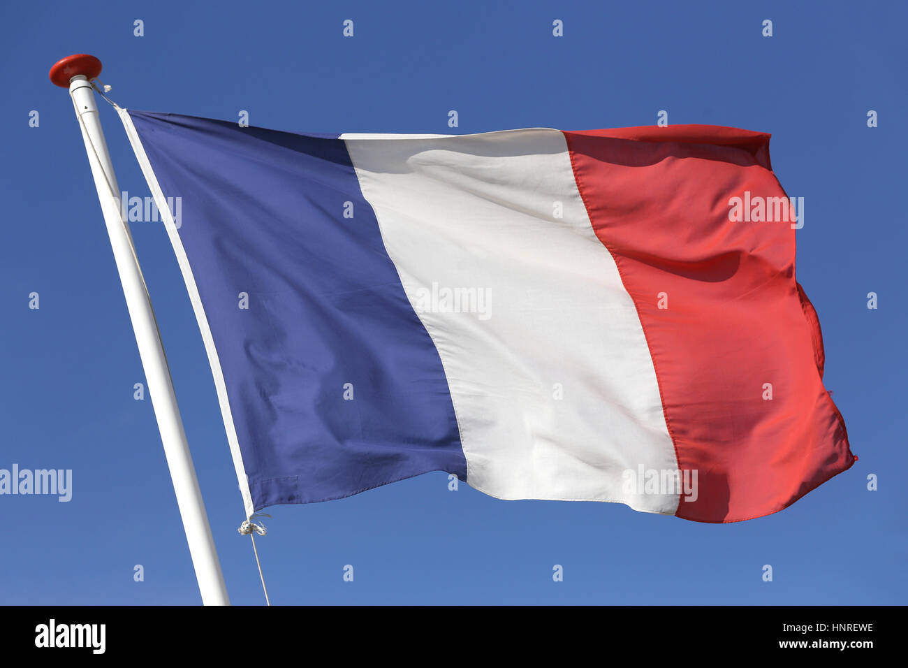 French flag flying in the wind Stock Photo