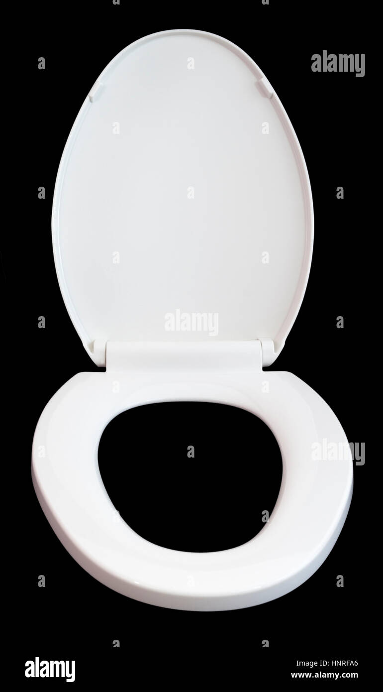isolated on black toilet set with lid up. Sorry ladies. Stock Photo