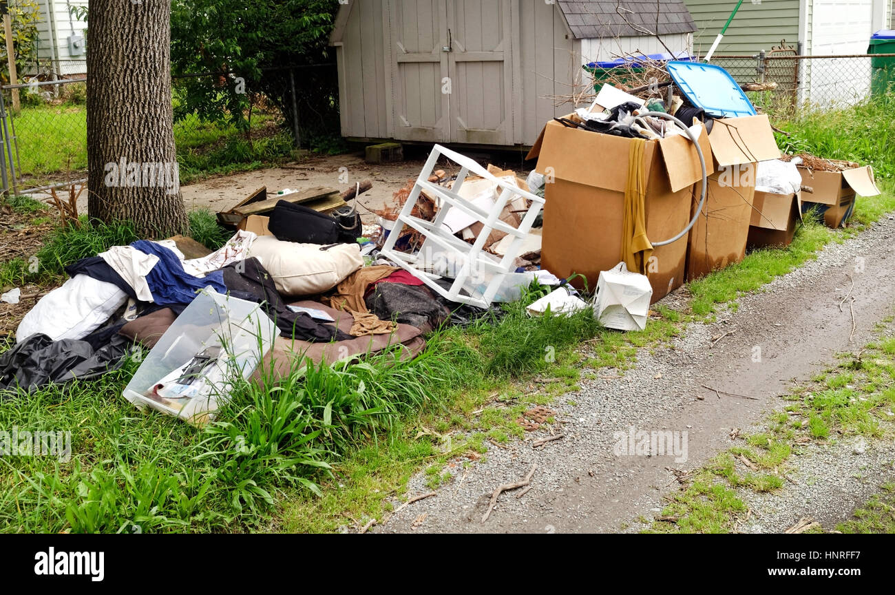 Sloppy neighbor's alley rubbish Stock Photo Alamy