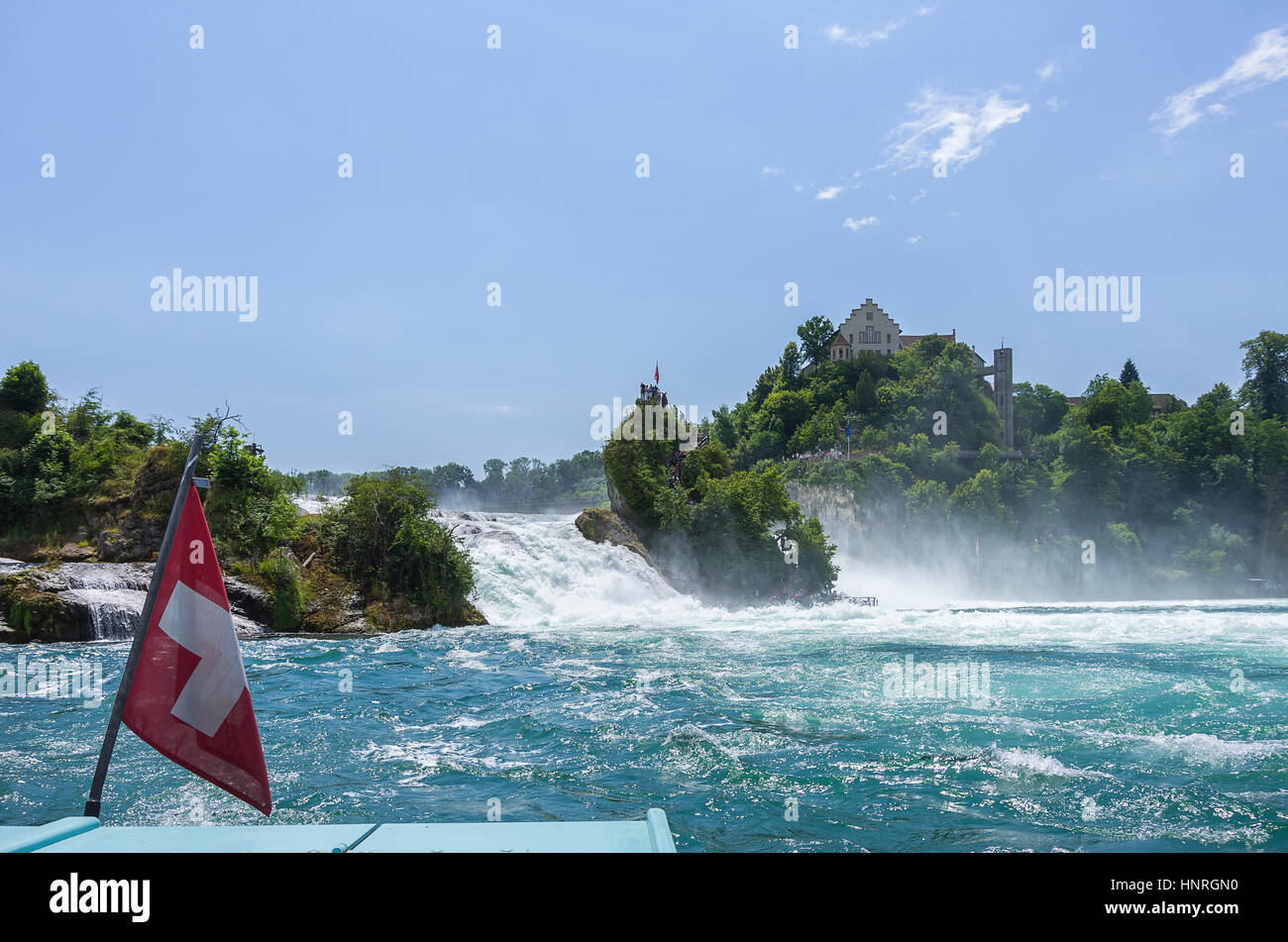 On the Rhine river in front of the Rhine Falls with view of Laufen Castle, Neuhausen, Switzerland. Stock Photo