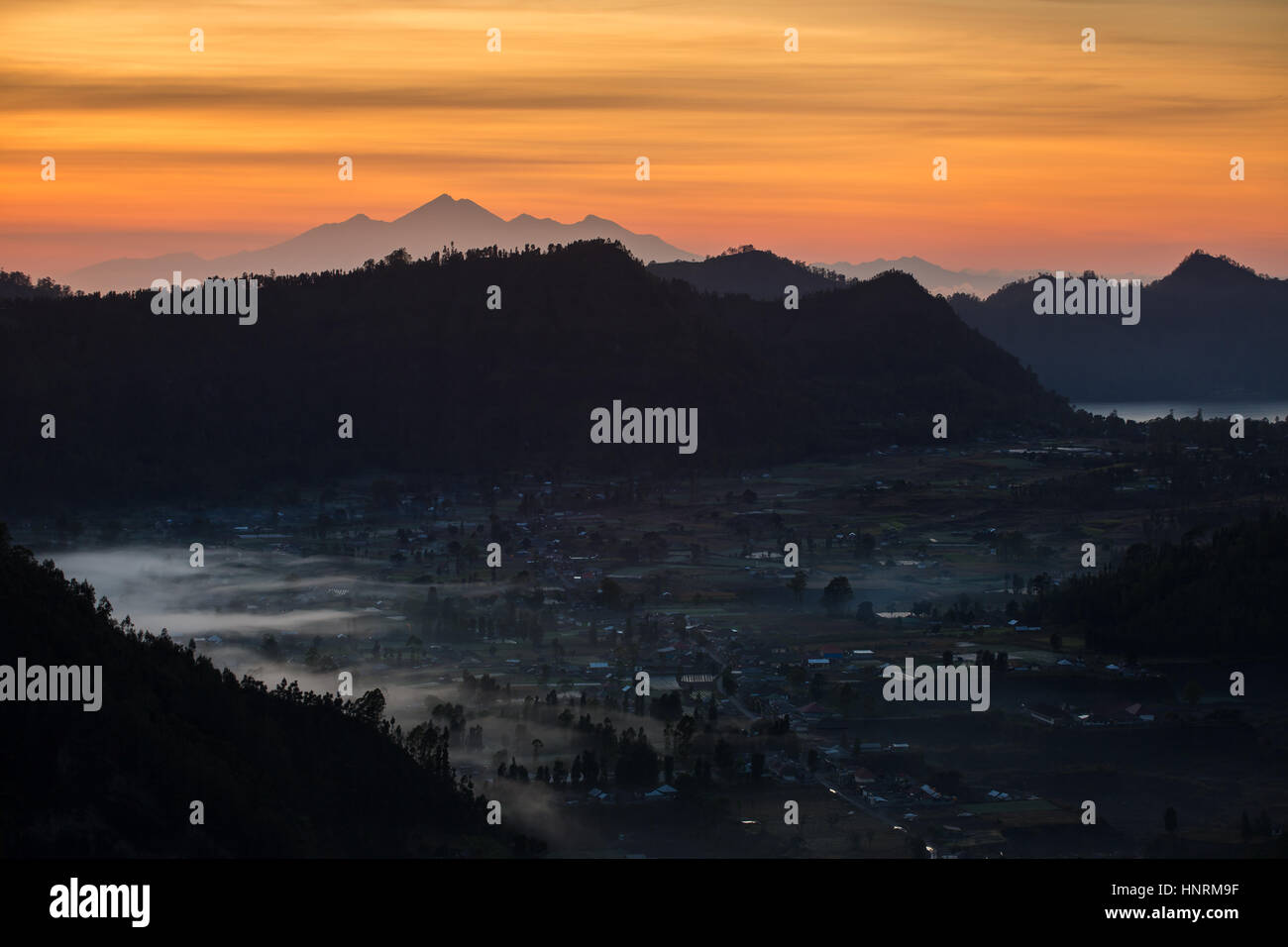 Sunrise over the caldera of Batur volcano in Bali, Indonesia Stock ...