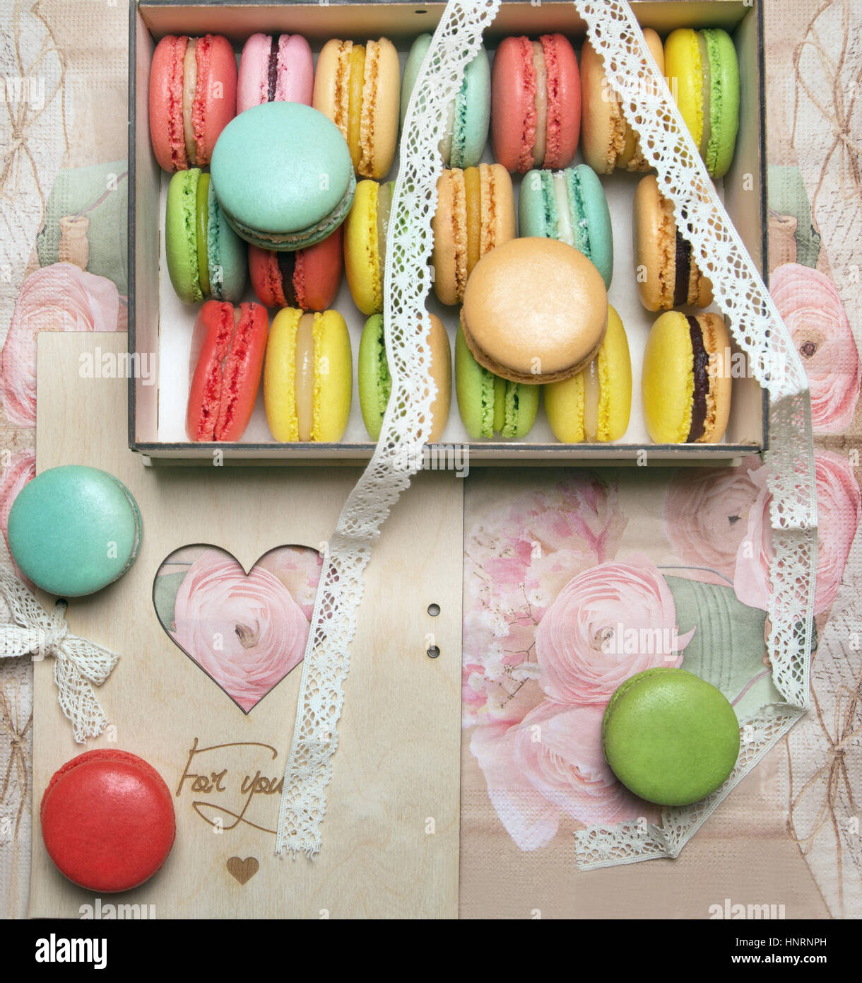 Macaroons in the box on vintage background Stock Photo