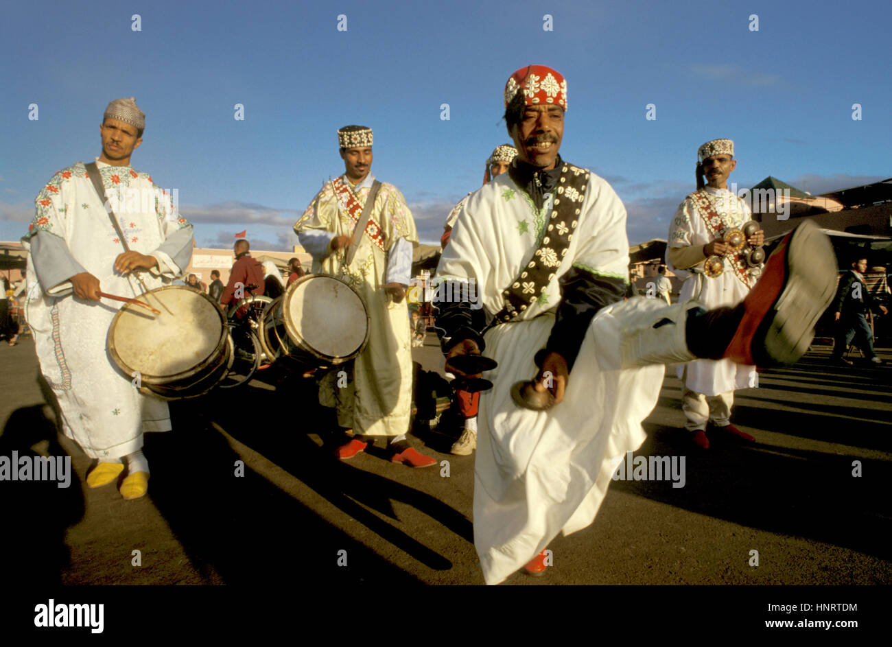 Gnaoua musicians performing traditional dances and music on the Jemaa el-Fnaa square, Marrakech, Morocco, Africa Stock Photo