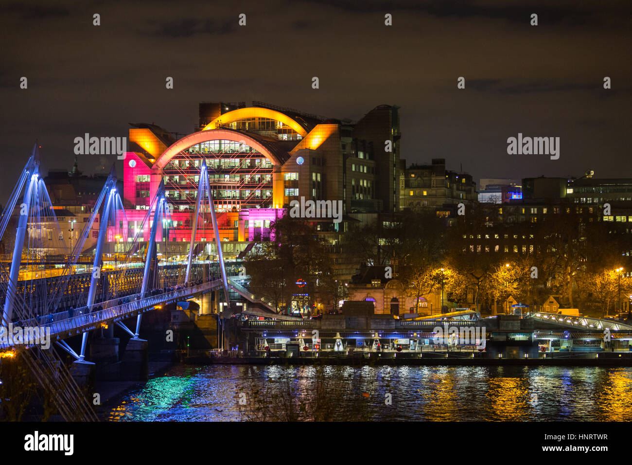 Night View Across The River Thames To The Illuminated Golden