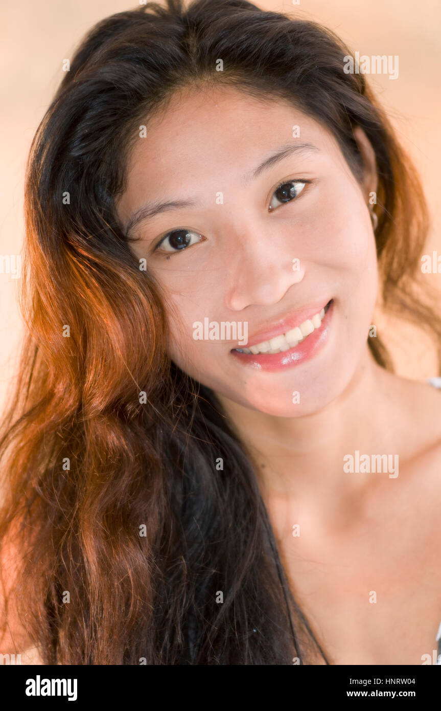 Young Asian woman in studio setting Stock Photo