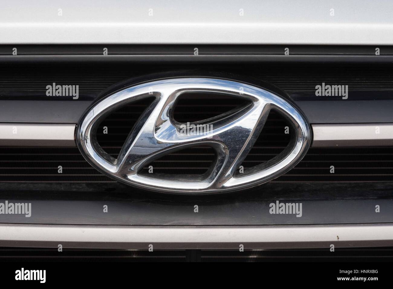 Hyundai logo on a dealership building. Hyundai is a multinational car maker headquartered in Seoul, South Korea. It was founded by Chung Ju-yung in 19 Stock Photo