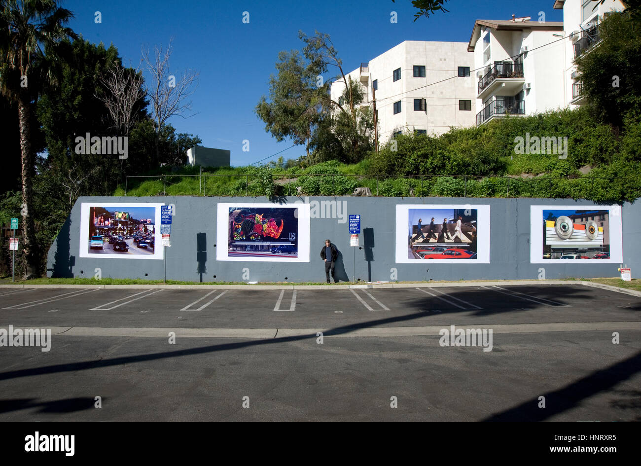 Los Angeles, USA. 14th February 2017. Photographer Robert Landau at new installation of Rock N Roll Billboard photos on the Sunset Strip in Los Angeles, CA Credit: Robert Landau/Alamy Live News Stock Photo