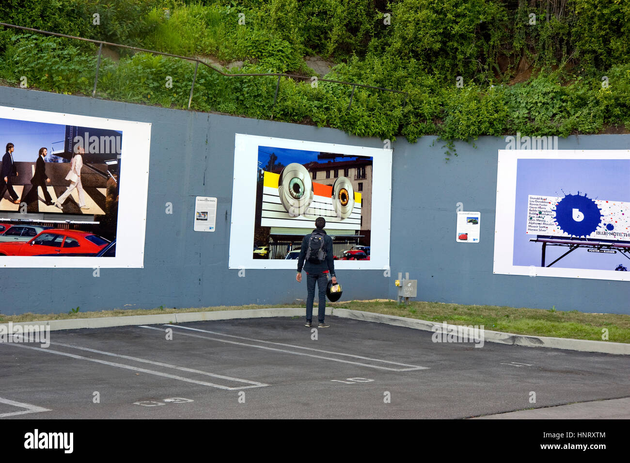 Los Angeles, USA. 14th February 2017. New installation of outdoor art exhibit at the West Hollywood parking lot on the Sunset Strip in Los Angeles featuring Robert Landau's photos documenting the classic hand-painted rock billboards from the 1960s and 70s. Credit: Robert Landau/Alamy Live News Stock Photo