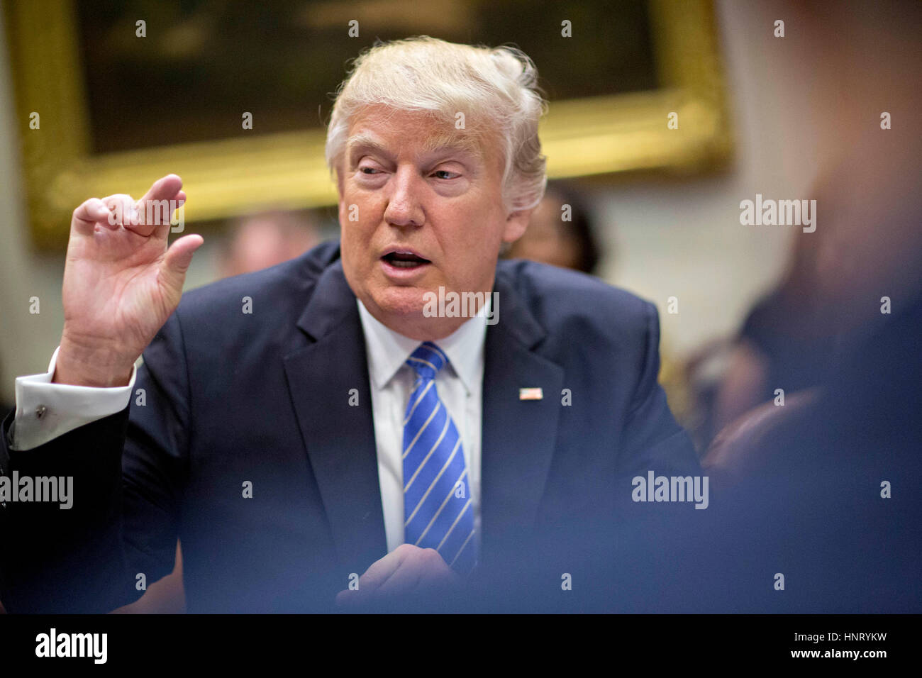 Washington DC, USA. 15th February 2017. U.S. President Donald Trump speaks as he participates in a listening session with the Retail Industry Leaders Association and member company chief executive officers in the Roosevelt Room of the White House in Washington, DC, U.S., on Wednesday, Feb. 15, 2017. Questions about ties between Trump's team and Russian intelligence agents mounted Wednesday after new reports of extensive contacts between the two, which are sure to fuel Republican calls for a deeper look at Trump's links to the country. Credit: MediaPunch Inc/Alamy Live News Stock Photo