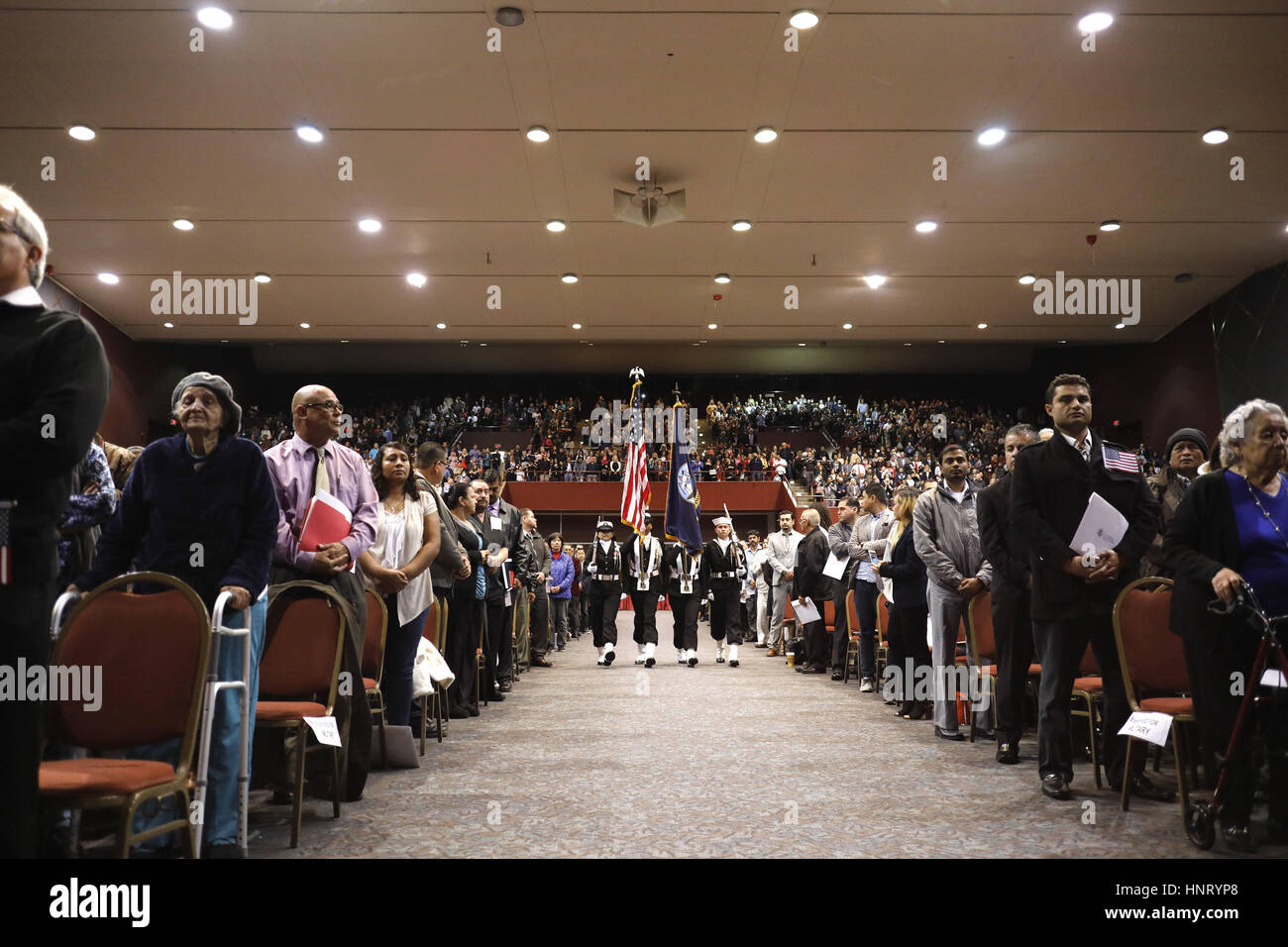 San Diego, CA, USA. 15th Feb, 2017. A Navy color guard brings the colors forward at the start of a ceremony where the Immigration and Naturalization Service conferred citizenship upon hundreds of immigrants. Credit: John Gastaldo/ZUMA Wire/Alamy Live News Stock Photo