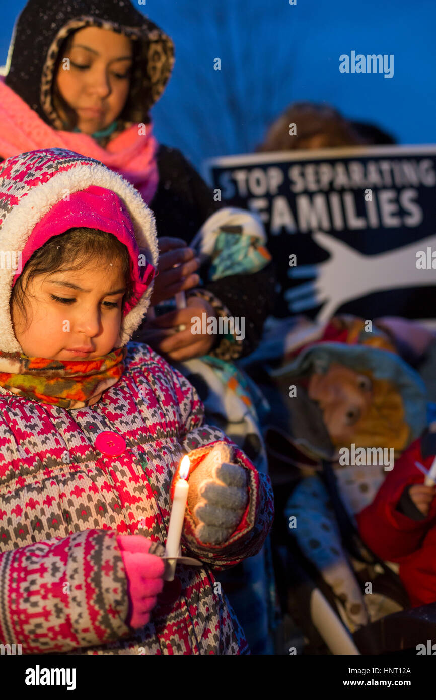 Detroit, Michigan, USA. 15th February 2017. People rally outside Western International High School against deportations of immigrants and against plans to expand the wall on the Mexican border. The vigil was organized by a coalition of Muslim, Jewish, and Hispanic organizations. Credit: Jim West/Alamy Live News Stock Photo