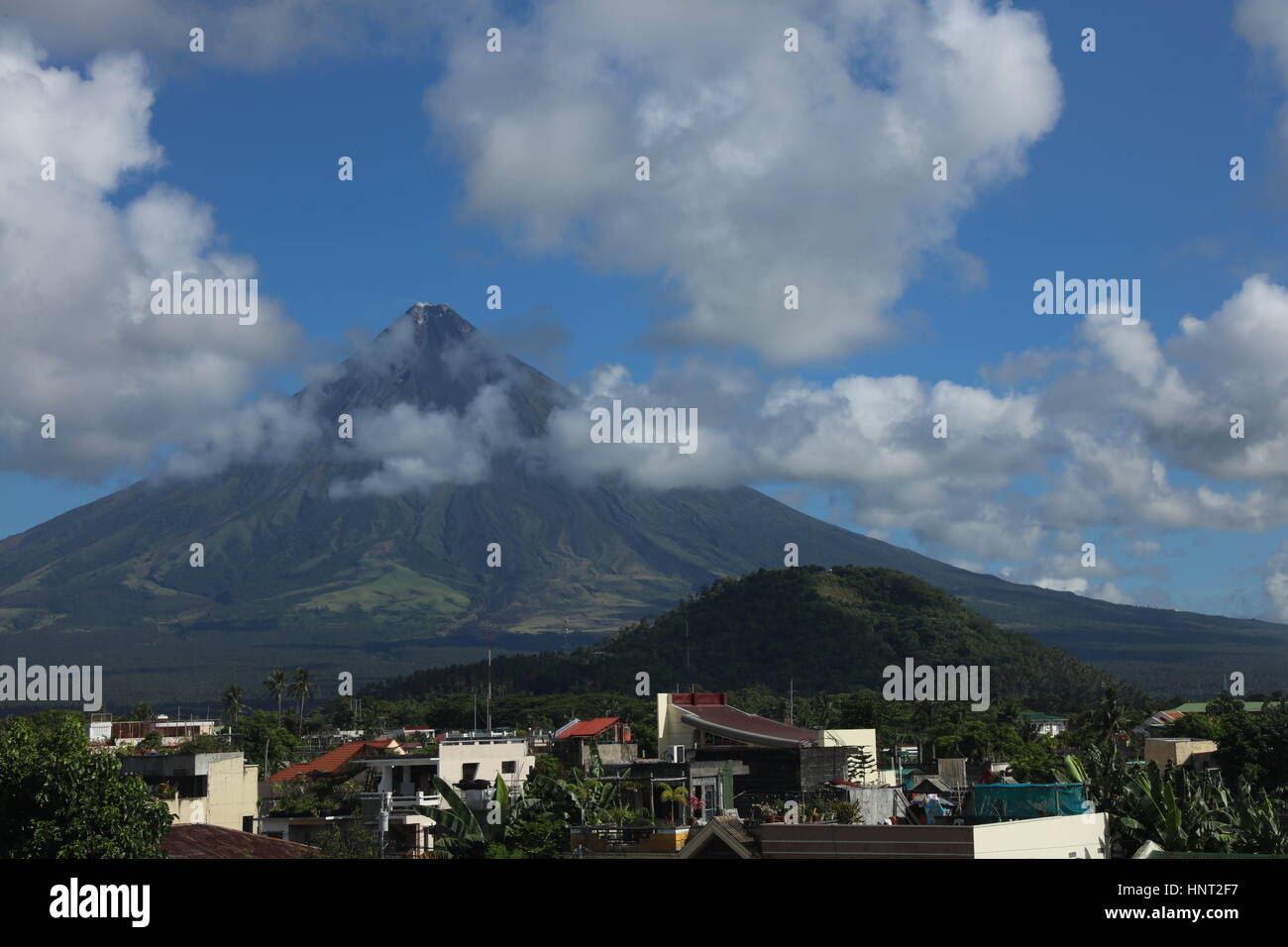 China. 30th Apr, 2016. Philippines-April 30 2016: (EDITORIAL USE ONLY. CHINA OUT) .Scenery of Mayon Volcano in Philippines, April 30th, 2016. Mayon Volcano, is an active stratovolcano in the province of Albay in Bicol Region, on the island of Luzon in the Philippines. Renowned as the ''perfect cone'' because of its symmetric conical shape, the volcano and its surrounding landscape was declared a national park on July 20, 1938, the first in the nation. It was reclassified a Natural Park and renamed Mayon Volcano Natural Park in the year 2000.Local folklore refers to the volcano being named a Stock Photo