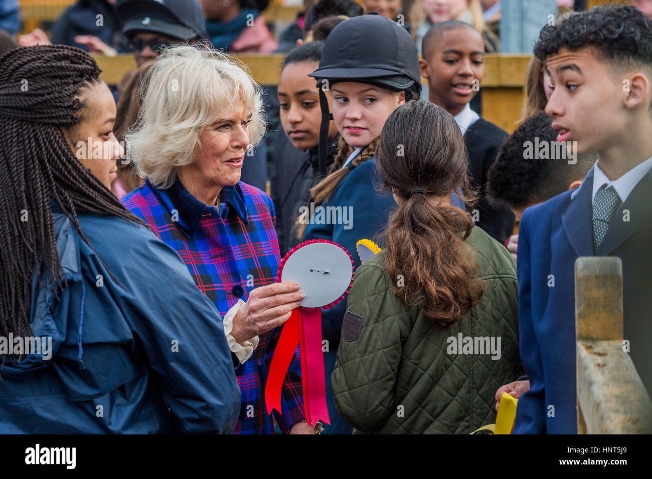 London, UK. 16th February 2017. the Duchess hands out rosettes - The Duchess of Cornwall, President, Ebony Horse Club, visits the charity's Brixton riding centre. The centre is celebrating its 21st birthday and its 6th year on this site. London 16 Feb 2017 . Credit: Guy Bell/Alamy Live News Stock Photo