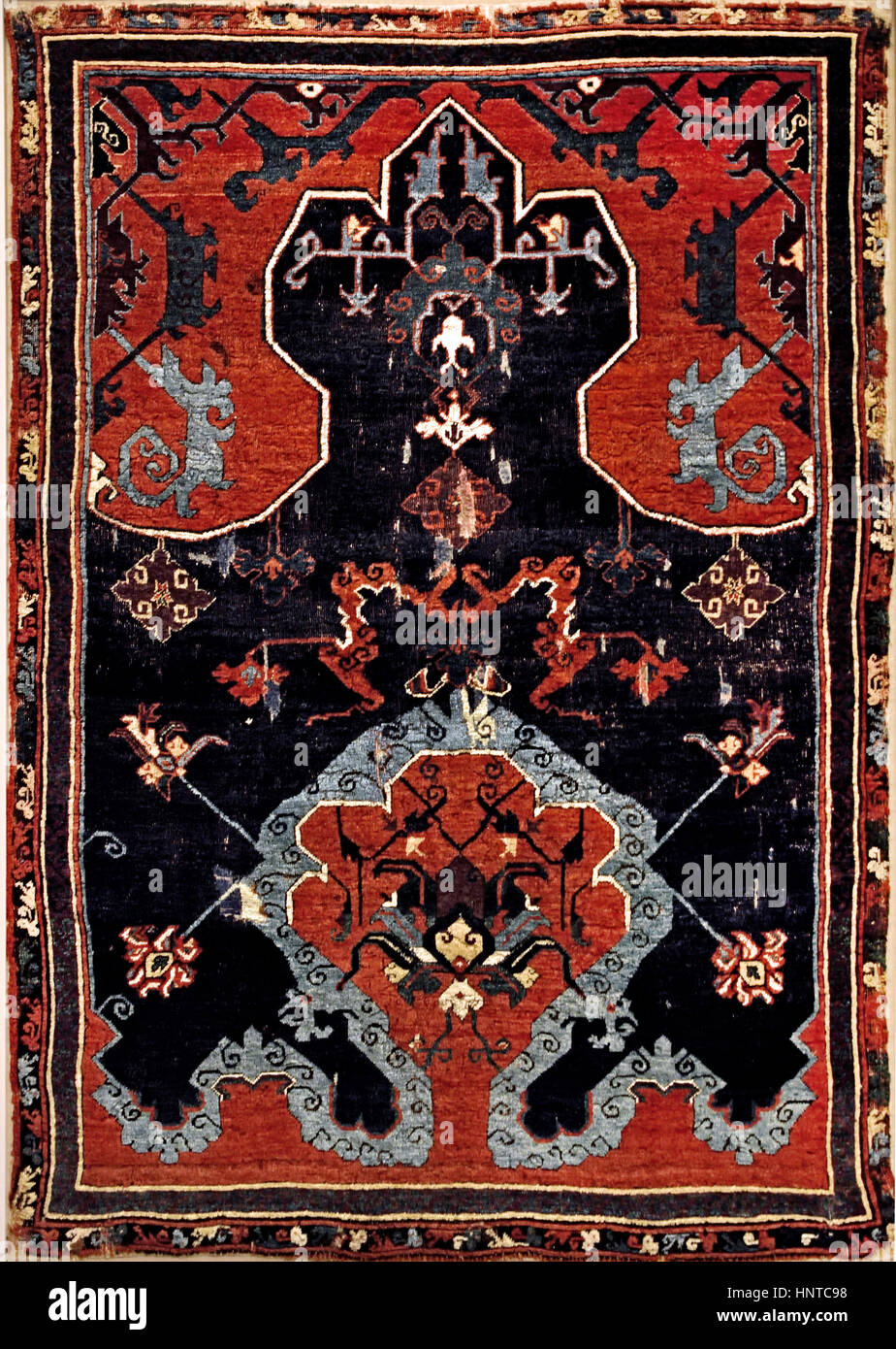 Cloud Band Ushak Anatolian Carpet 1871 turkey ( Empress Elisabeth of Austria ( Sissi ) was portrayed standing on this carpet in 1882 ( painter Heinrich von Angeli ) Stock Photo
