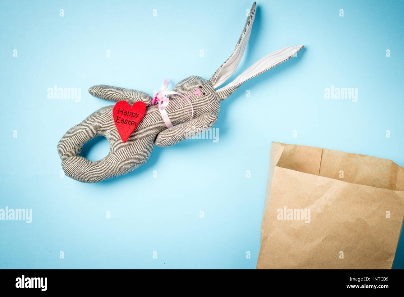 Easter bunny on a blue background Stock Photo - Alamy