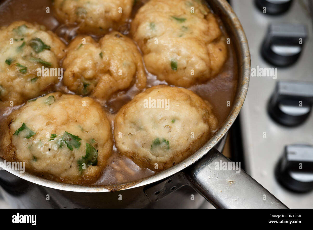 Homemade beef stew with parsley dumplings Stock Photo Alamy
